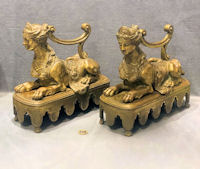 Pair of Brass Sphinx Fire Dogs