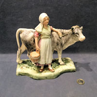 Ceramic Dairy Maid and Cow Figure