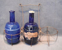 Pair of Blue Glass Fire Grenades and Basket FG19