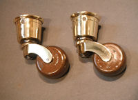 Pair of Brass and Ceramic Castors C29