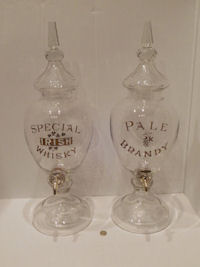 Pair of Glass Whisky Urns