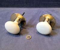 Pair of White Ceramic and Brass Door Pulls