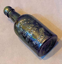 T.E Crook of Hungerford Beer Bottle BJ242